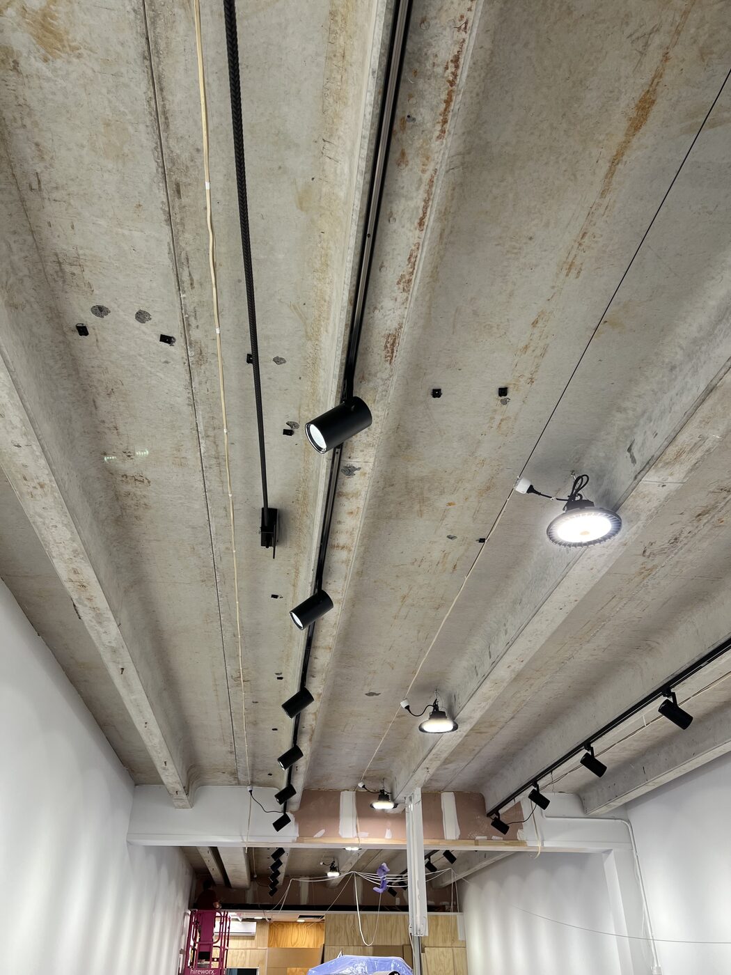 Recessed LED downlights in a hallway ceiling