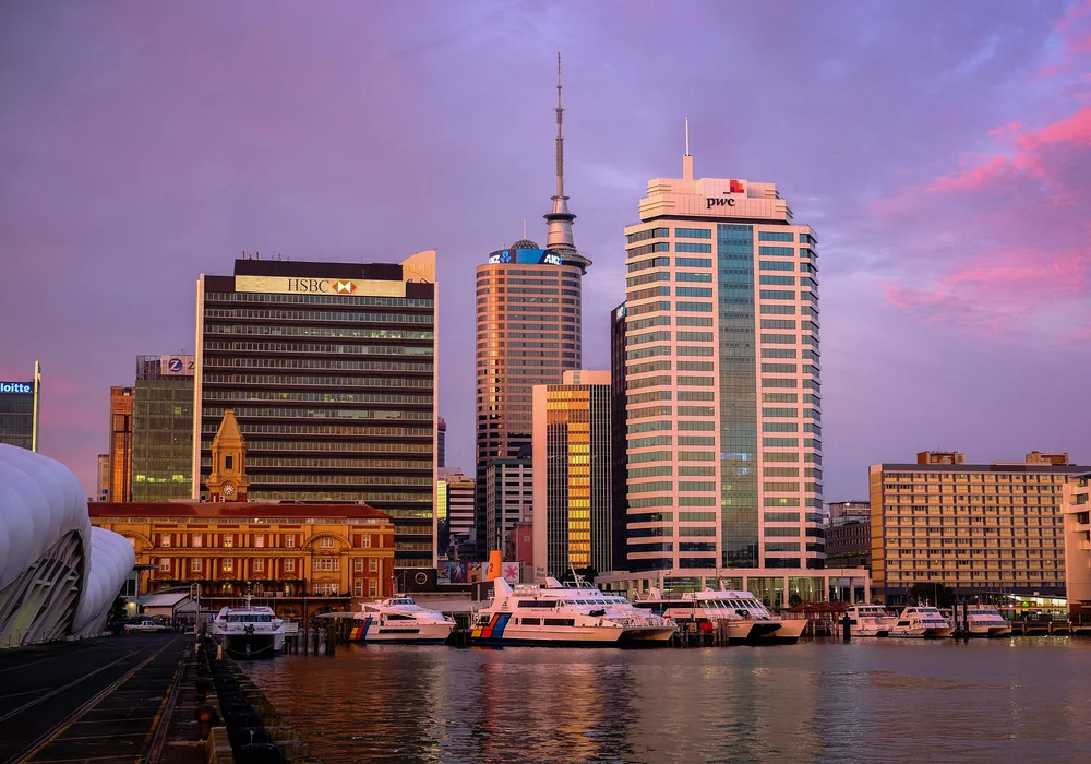 Auckland city towers and the Ferry Building at sunset
