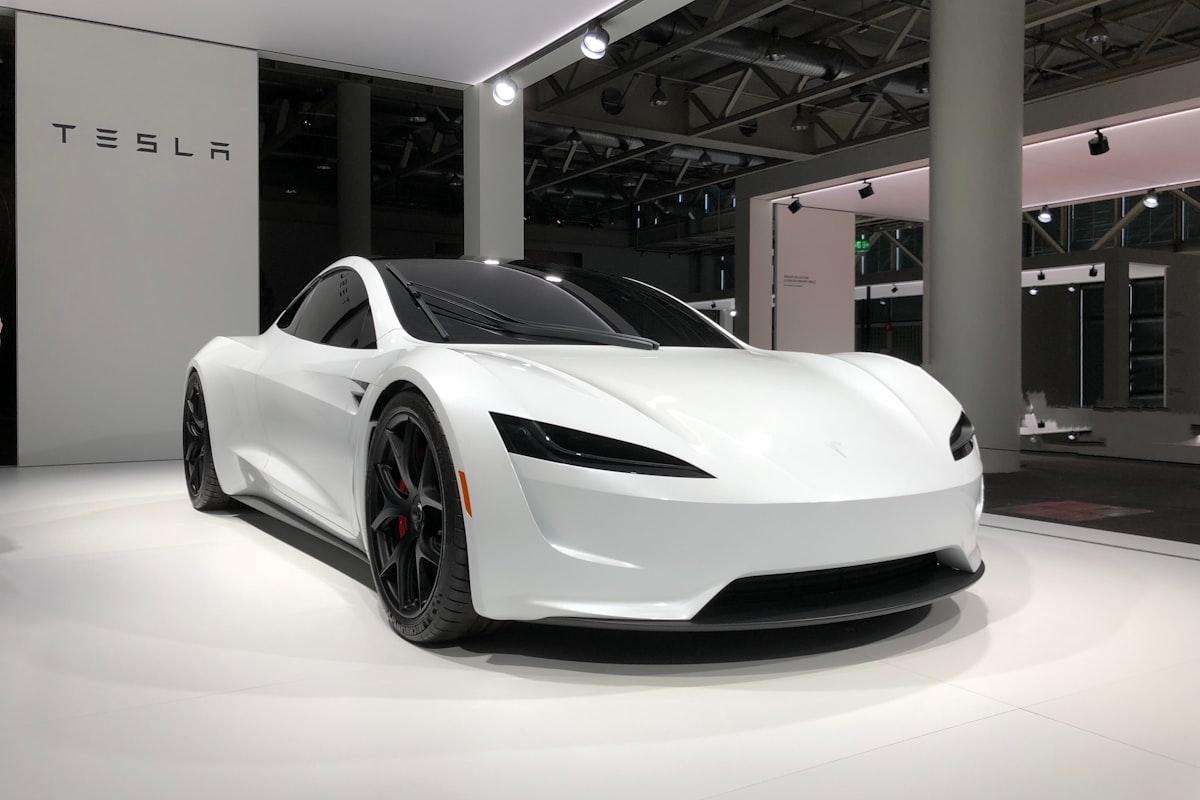 Electric vehicle connected to a wall charging unit