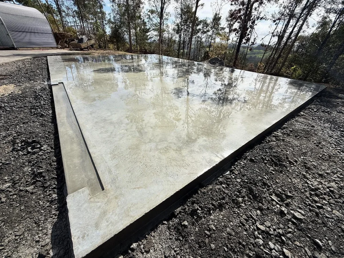 Finished garage concrete slab laid by Scorpion Hardscapes