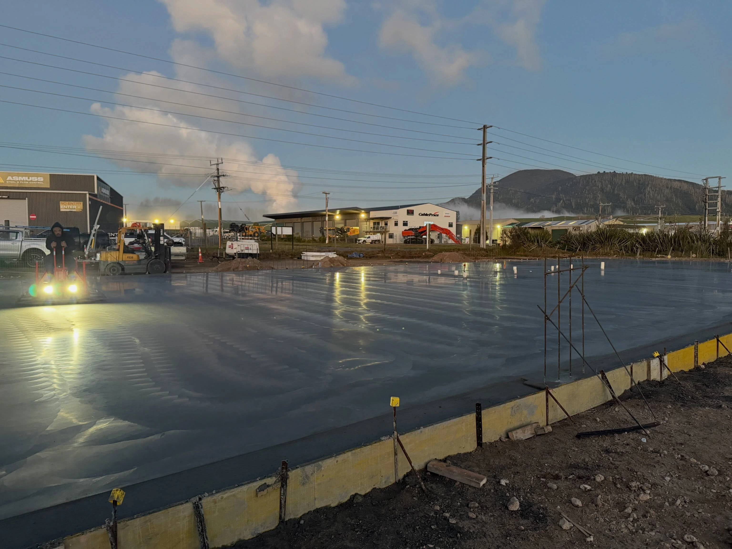 Large fresh commercial concrete slab in the early light